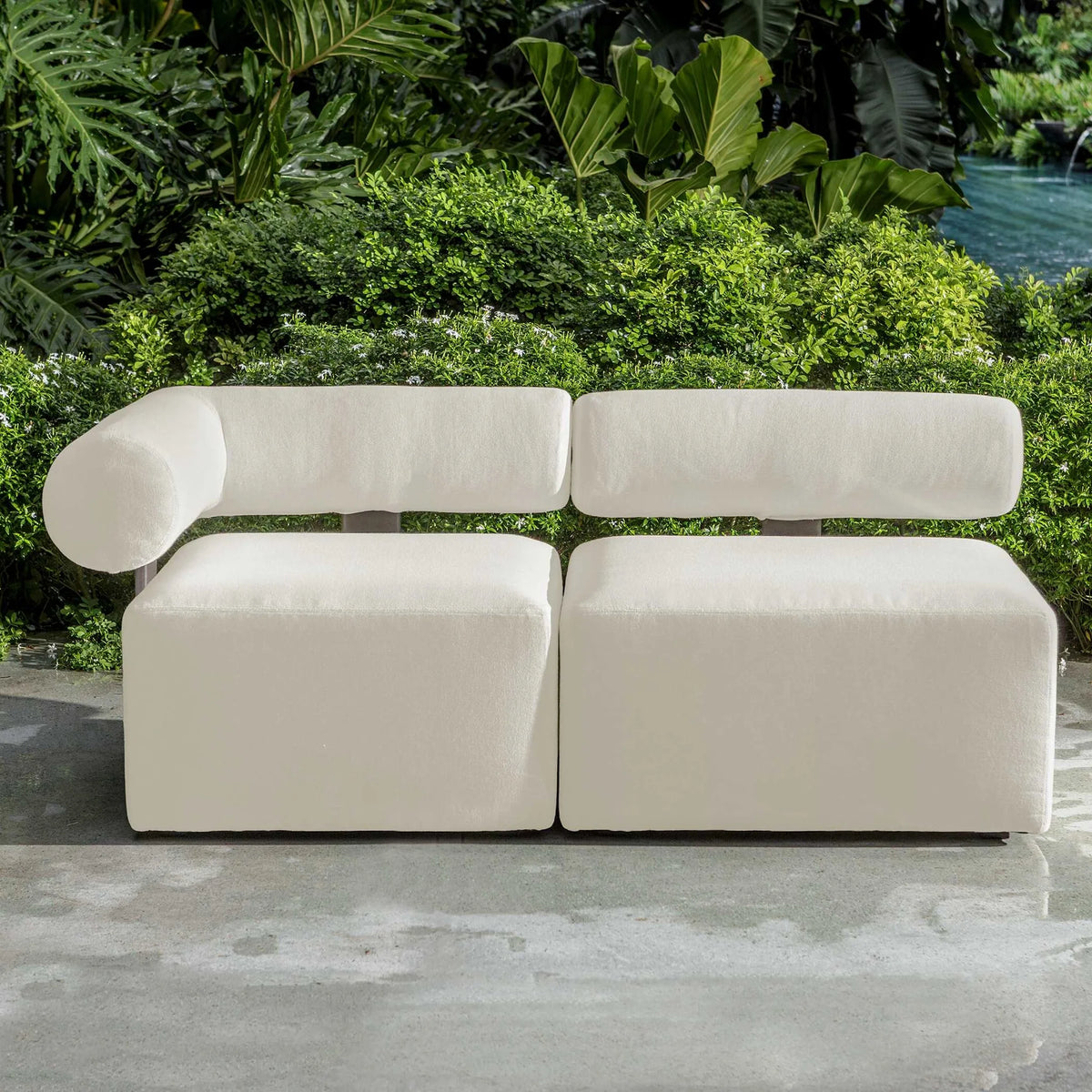 White Bolster Back Armless Outdoor Sofa