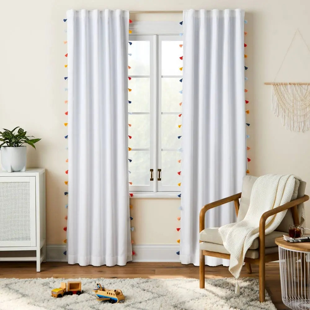 Pillowfort 95" Blackout Tassel Curtain Panel - UV Protection and Noise Reduction for Peaceful Sleep