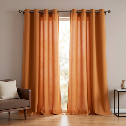 Grommet Blackout Curtains shown styled in a living room
