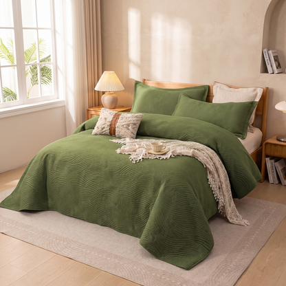 Solid Quilted Comforter Set styled on bed