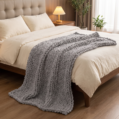 Hand-Woven Chunky Knit Throw Blanket draped on bed