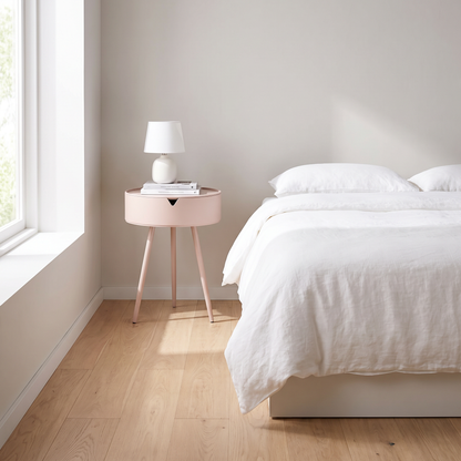 Modern Nightstand with Drawer, Pink beside a bed